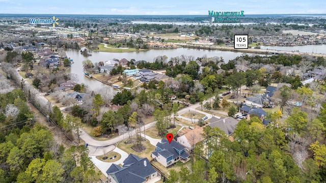 bird's eye view with a water view and a residential view