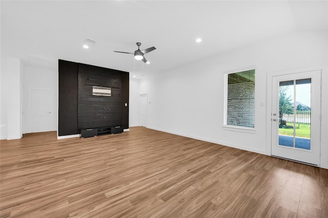 unfurnished living room with light wood-style floors, recessed lighting, ceiling fan, and baseboards