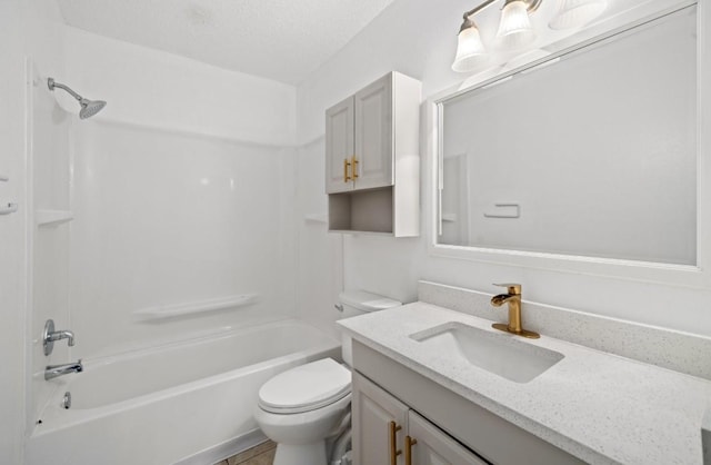 full bath featuring toilet, shower / tub combination, a textured ceiling, and vanity