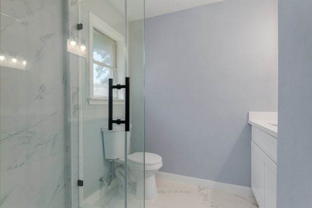 full bath with marble finish floor, a marble finish shower, toilet, vanity, and baseboards