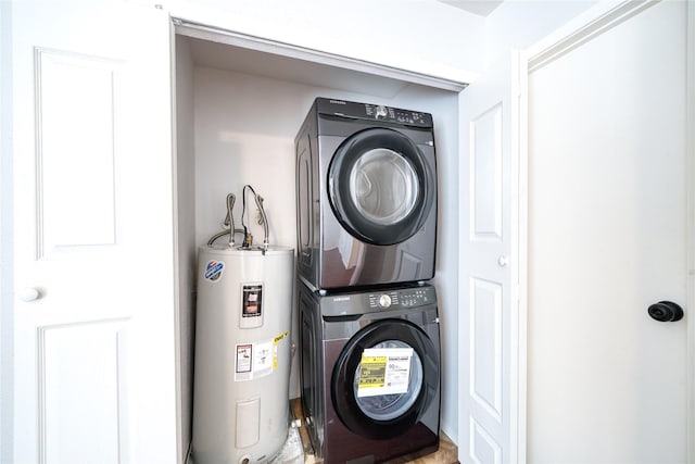 laundry room with stacked washing maching and dryer, water heater, and laundry area