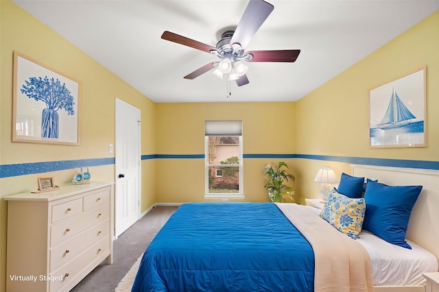 carpeted bedroom with ceiling fan