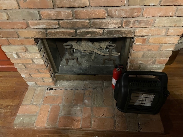 room details featuring a fire extinguisher and a wood stove