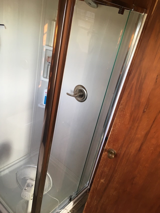 bathroom with a stall shower