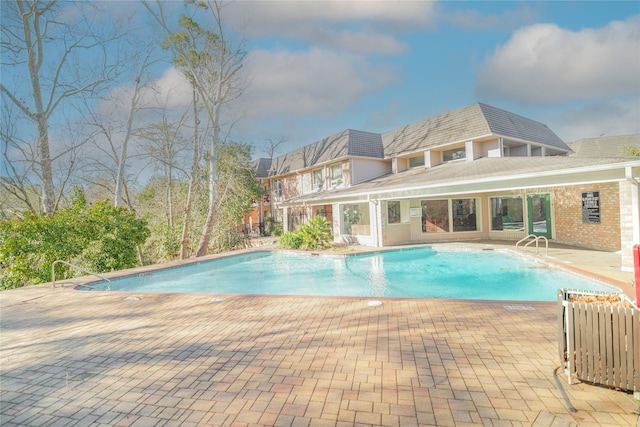 community pool with a patio