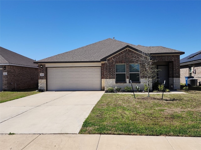 view of front facade with an attached garage, central air condition unit, brick siding, driveway, and a front lawn