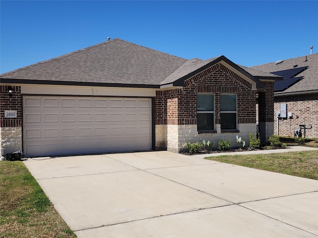 single story home with driveway, brick siding, and roof with shingles