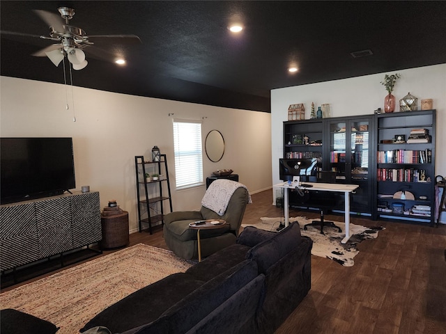 living area featuring baseboards, a ceiling fan, wood finished floors, and recessed lighting