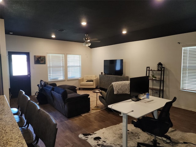 interior space with recessed lighting, visible vents, a ceiling fan, wood finished floors, and baseboards