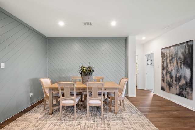 dining area with recessed lighting, wood finished floors, visible vents, and baseboards