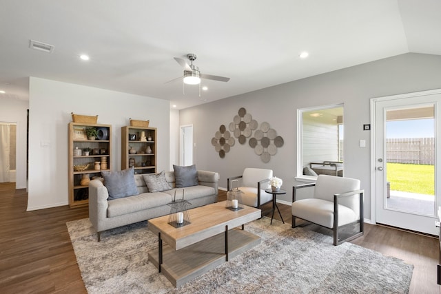 living area with dark wood-style floors, recessed lighting, visible vents, a ceiling fan, and baseboards