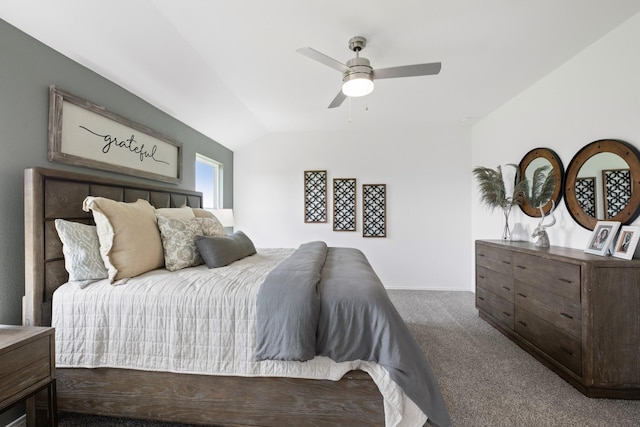 bedroom with lofted ceiling, carpet flooring, and ceiling fan