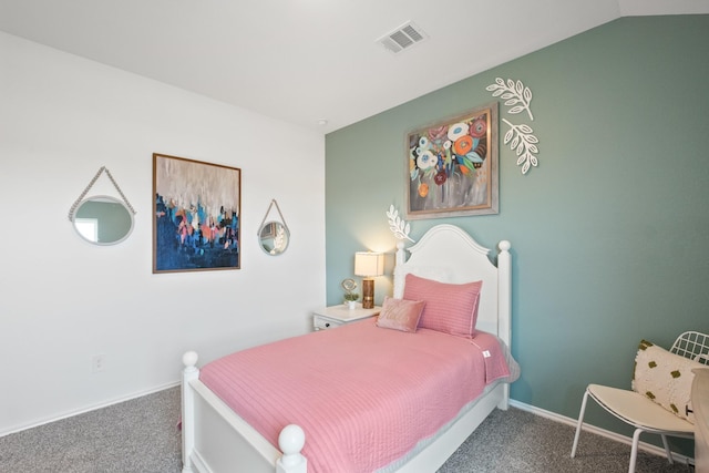 carpeted bedroom with visible vents and baseboards