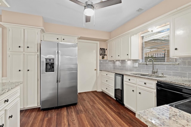 kitchen with dark wood-style floors, a sink, white cabinetry, and stainless steel fridge with ice dispenser