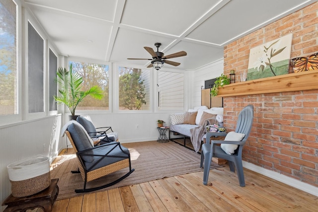 sunroom featuring ceiling fan and coffered ceiling