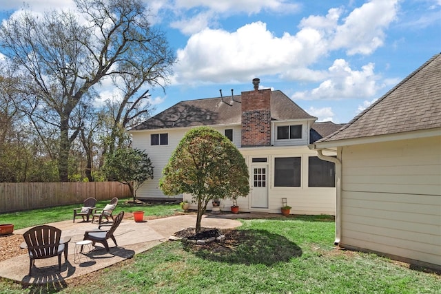 17302 Loring Ln, Spring, TX 77388 - back of property with a patio area and roof with shingles