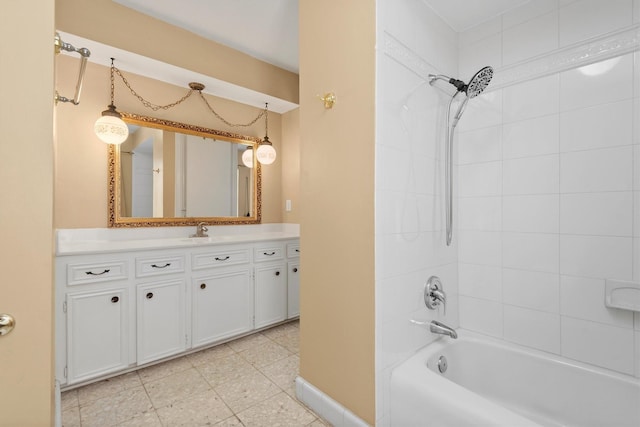 full bath with shower / tub combination, baseboards, and vanity