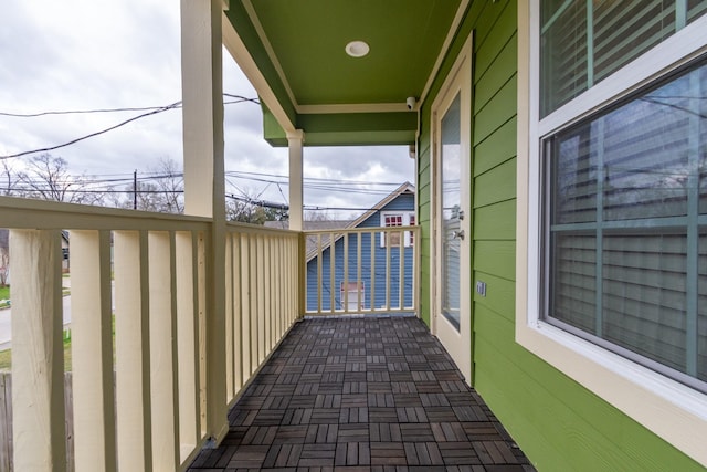 view of patio featuring a balcony