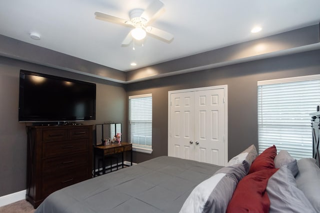 bedroom featuring a ceiling fan, baseboards, a closet, and recessed lighting