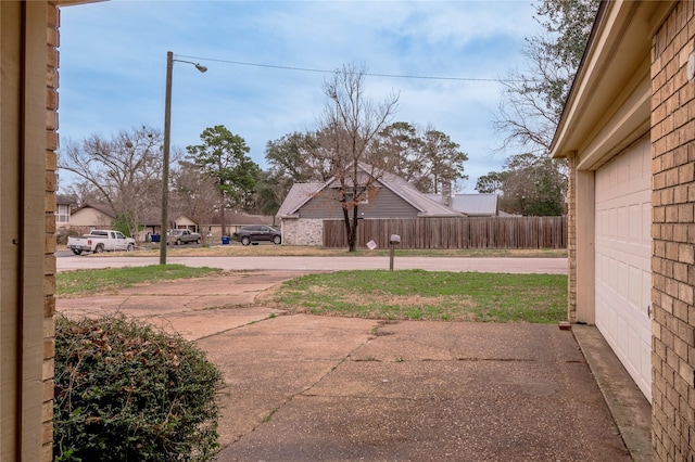 view of yard featuring fence