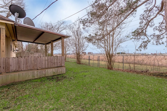 view of yard featuring fence