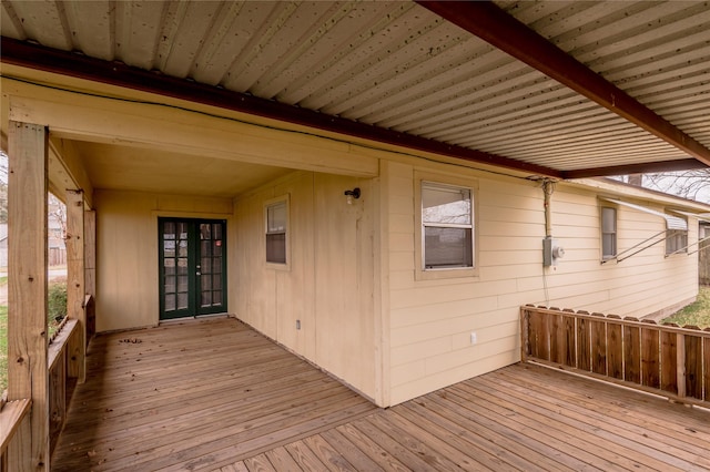 wooden deck featuring french doors