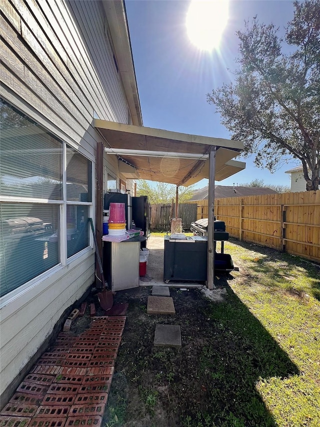 view of yard with fence