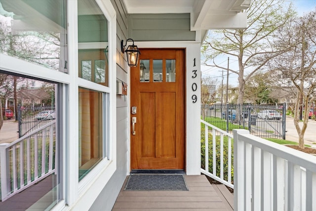 doorway to property with covered porch