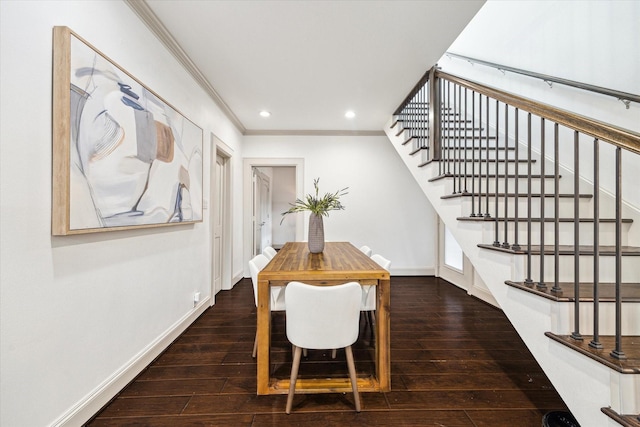 dining space with wood-type flooring, baseboards, crown molding, and recessed lighting