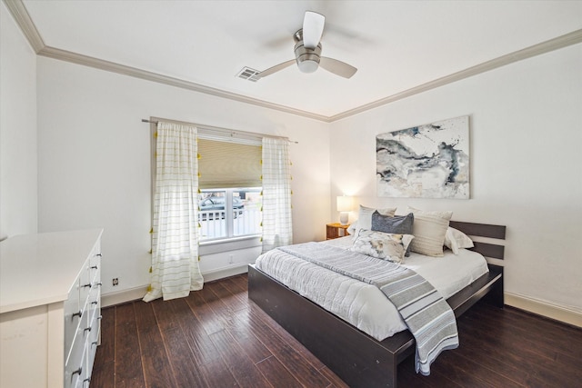 bedroom featuring baseboards, visible vents, crown molding, and hardwood / wood-style floors