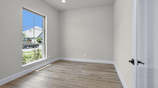 21207 Palm Arbor Dr, Cypress, TX 77433 - spare room featuring light wood-style floors and recessed lighting