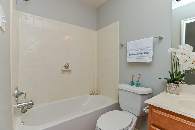 full bathroom with shower / bathtub combination, toilet, and vanity