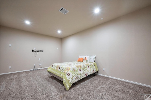 carpeted bedroom featuring baseboards, visible vents, and recessed lighting