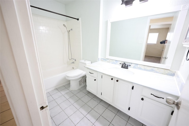 full bathroom featuring toilet, vanity, washtub / shower combination, and tile patterned floors