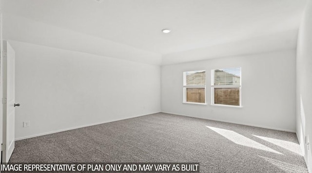 carpeted empty room with baseboards