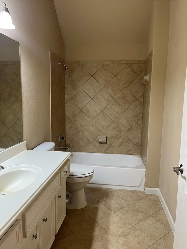 bathroom with toilet, vanity, shower / tub combination, tile patterned flooring, and baseboards