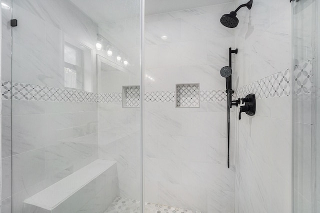 full bathroom featuring a stall shower