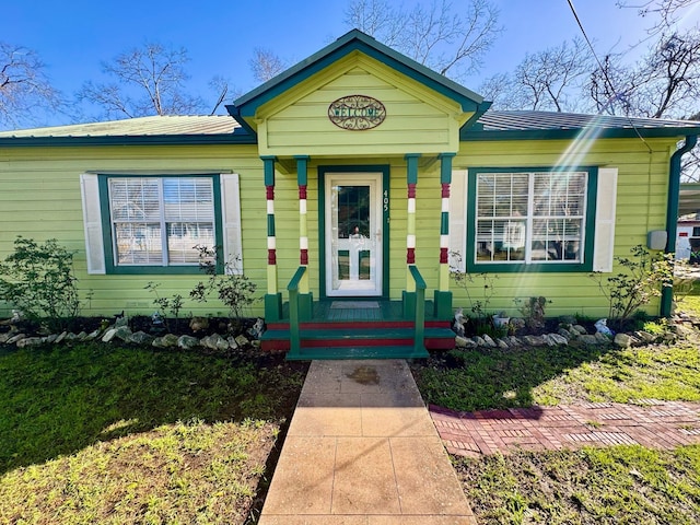 view of front of home featuring metal roof