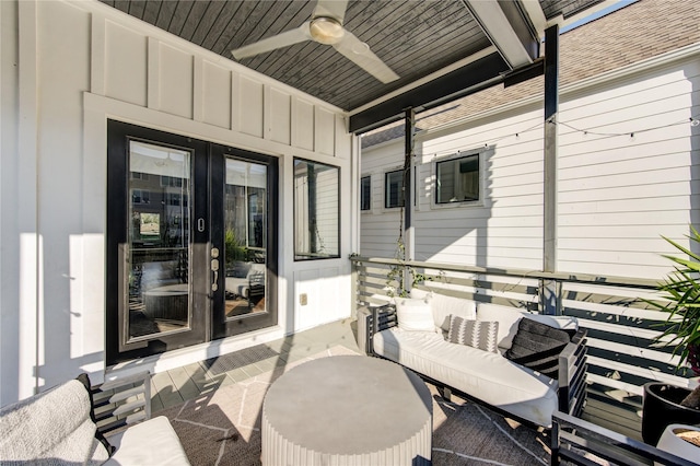 view of patio / terrace featuring ceiling fan and french doors