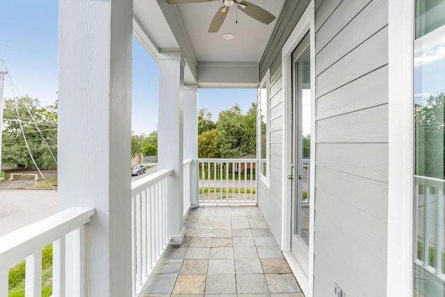 balcony featuring a ceiling fan