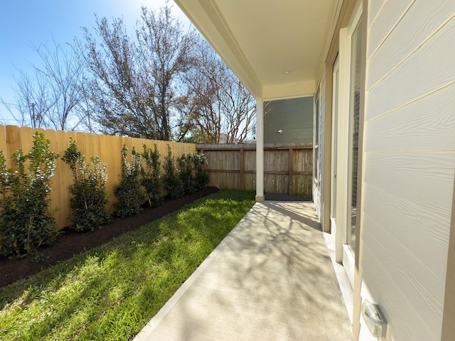 view of yard with a fenced backyard and a patio area