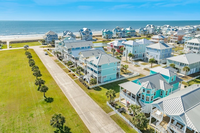 aerial view featuring a water view and a residential view