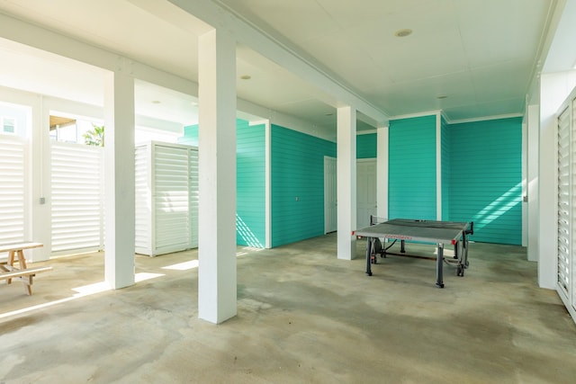 interior space featuring concrete floors