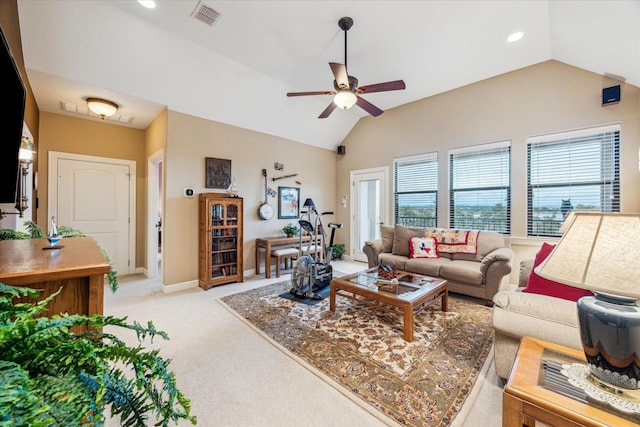 living room with baseboards, visible vents, a ceiling fan, light colored carpet, and vaulted ceiling