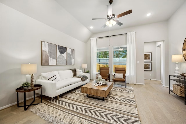 18823 Cypress Meadow Ct, Magnolia, TX 77355 - living area with light wood-style floors, a ceiling fan, vaulted ceiling, and recessed lighting