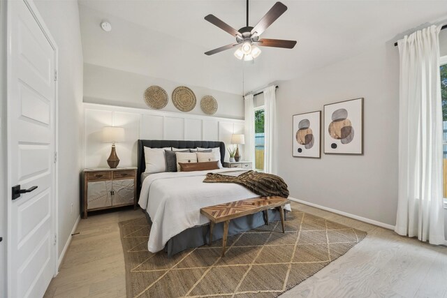 18823 Cypress Meadow Ct, Magnolia, TX 77355 - bedroom with light wood-style floors and ceiling fan