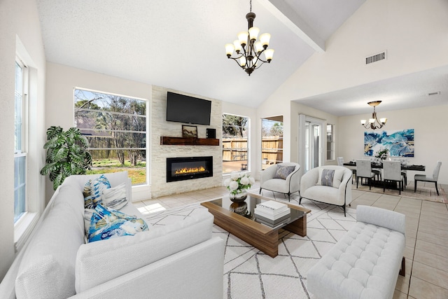 living room featuring a chandelier, tile patterned flooring, a large fireplace, visible vents, and beamed ceiling