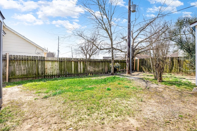 view of yard featuring a fenced backyard