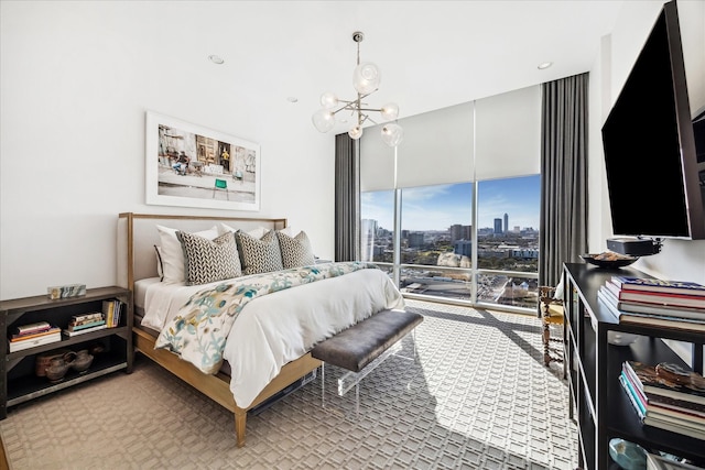 bedroom featuring an inviting chandelier