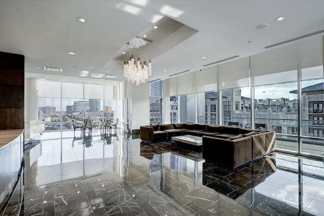 building lobby featuring visible vents and a city view